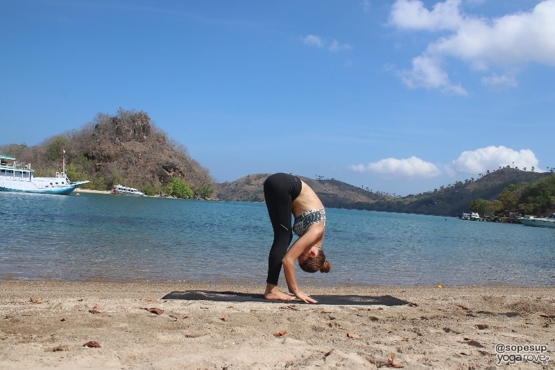standing forward fold- yoga for glutes and legs