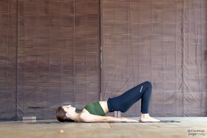 yogi practicing bridge pose 