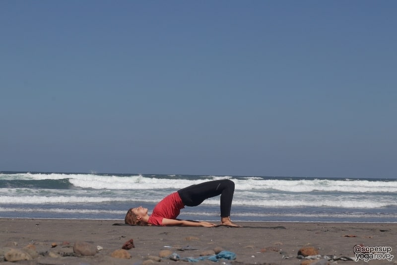 yogi practicing bridge pose for weight loss