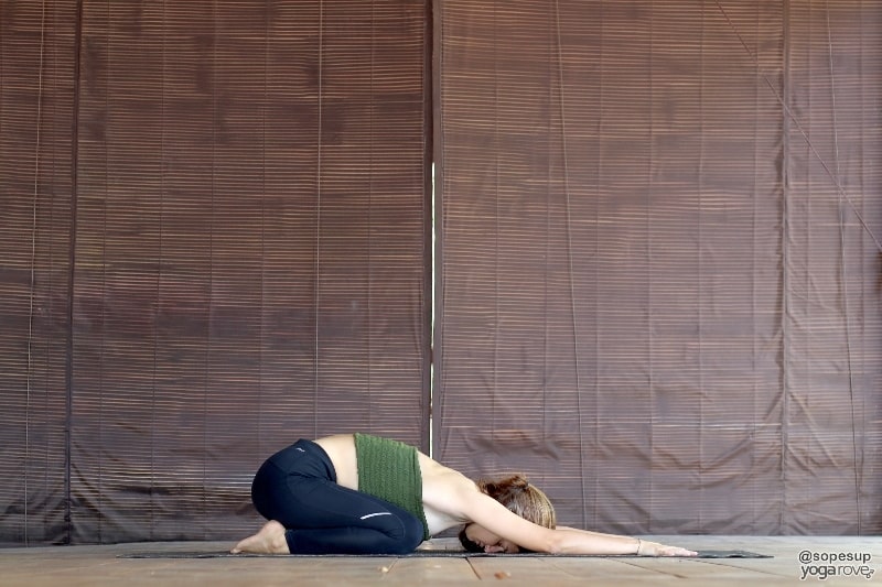 yogi practicing childs pose- gentle yoga