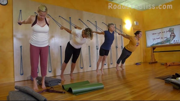 multiple students practicing Iyengar yoga