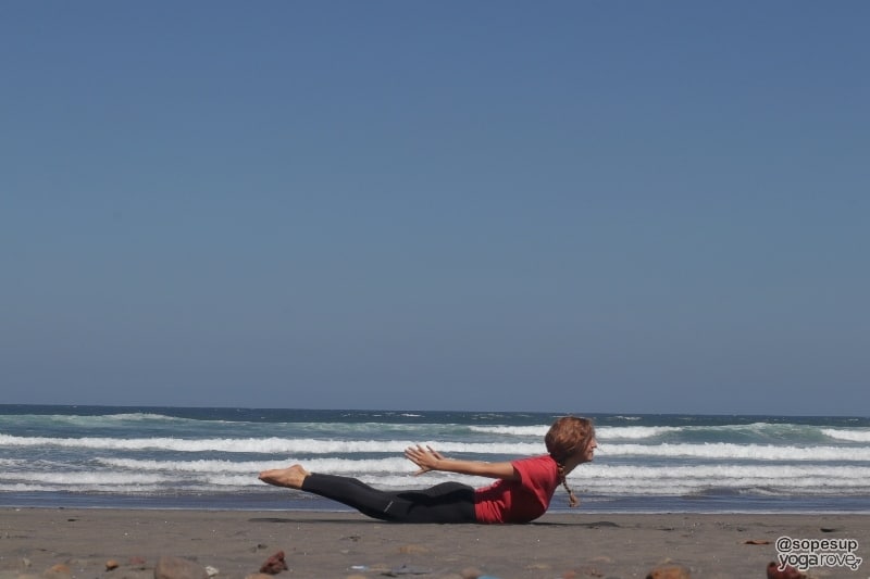 yogi practicing locust for weight loss