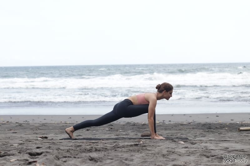 yogi practicing low lunge in sun salutation a