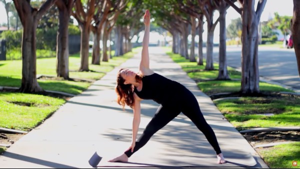 yoga teacher teaching prenatal yoga