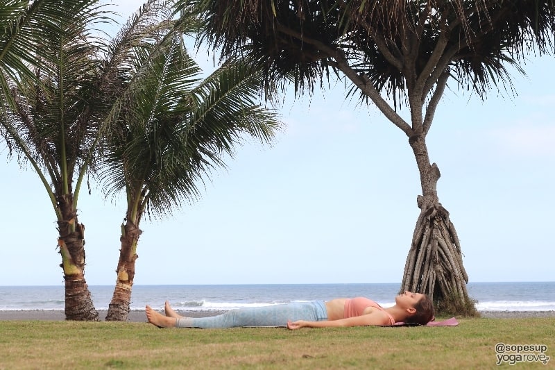 yogi practicing savasana/resting pose after running