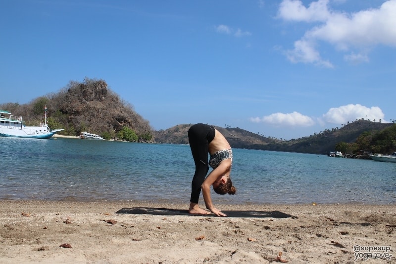 yogi practicing standing forward fold for flexibility