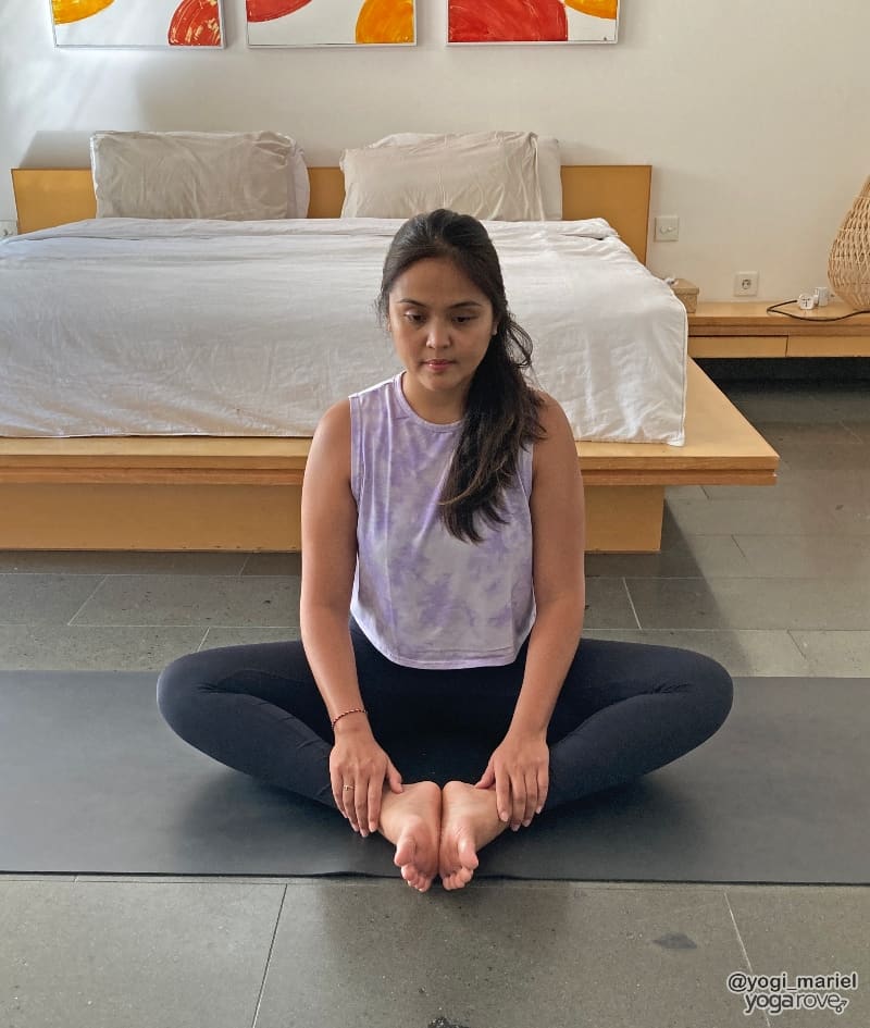 Yogi practicing yoga at home