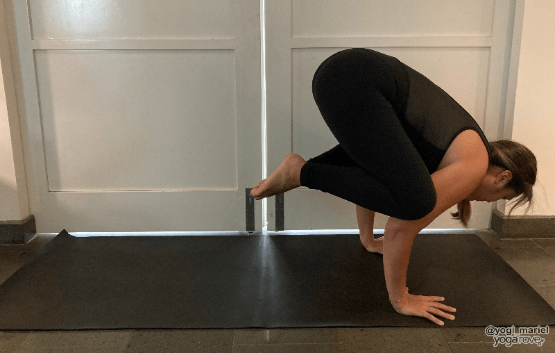 Yogi practicing Crow pose